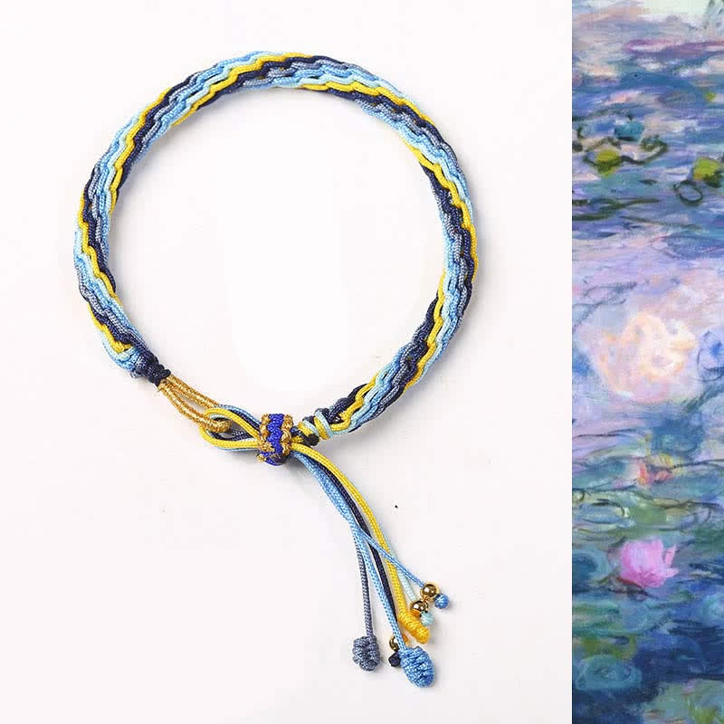 Armband mit blauem und gelbem Seil auf weißem Hintergrund flach fotografiert