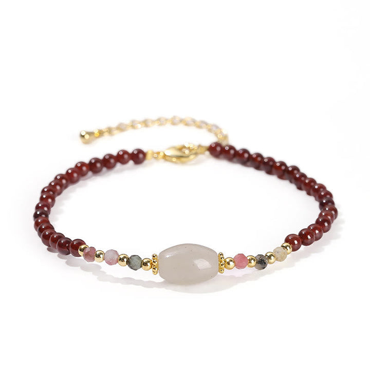 Armband Granat Jade mit Mondstein Zentrum elegantes Design