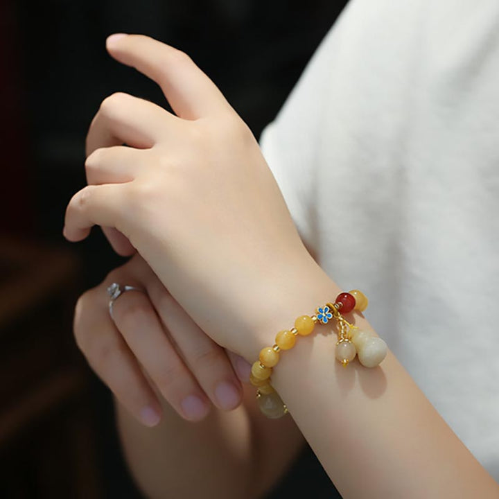 Jade Armband Gold mit gelben Perlen Glück Wohlstand eleganter Schmuck