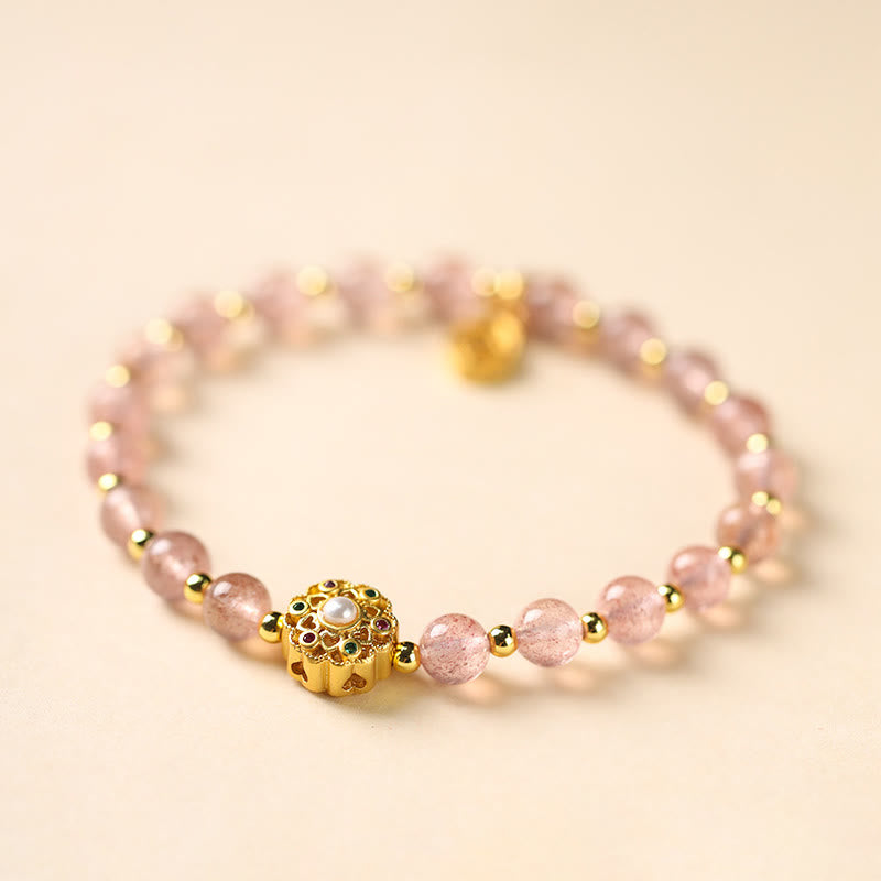 Armband Erdbeerquarz Labradorit mit goldenen Perlen elegant.
