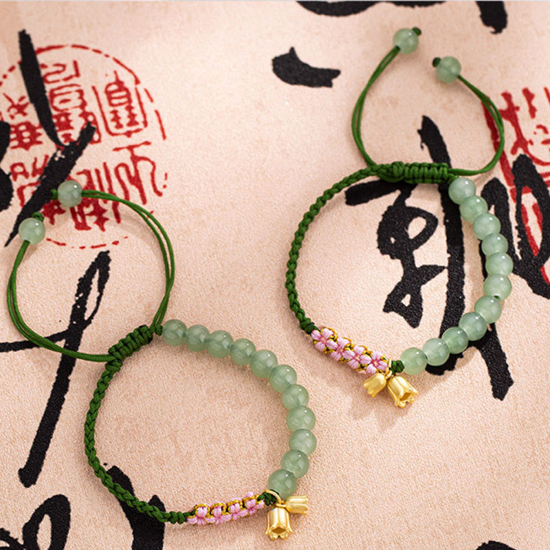 Jade Armband grüne Perlen goldene Glocke Glück Harmonie elastisch