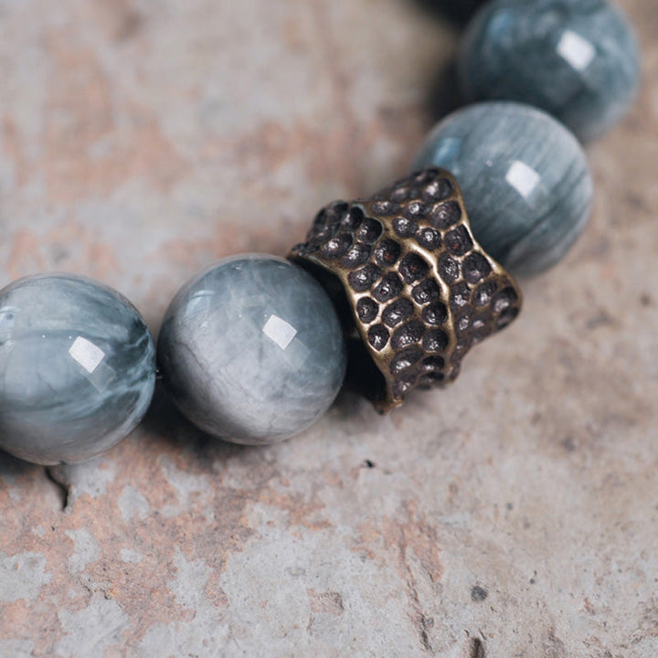 Kupfer Armband mit Ebenholz und grauem Stein elegant.