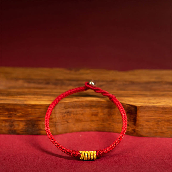 Rotes Schutz Armband – Glück Energie Seil geflochten Gold Perlen