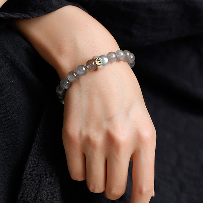 Mondstein Armband Chinesisches Tierkreis am Handgelenk grauer Naturstein elastisch