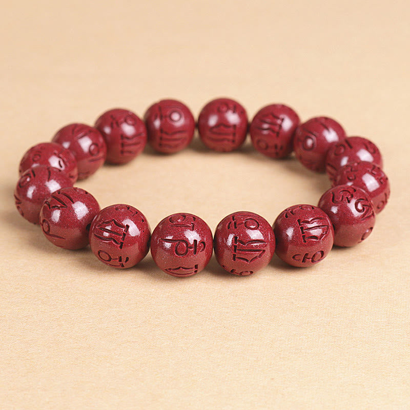 Armband Zinnober Om Mani Padme Hum rote Perlen elastisch Glück Wohlstand