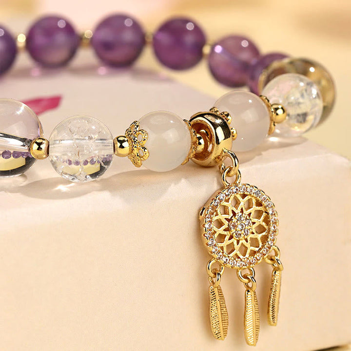 Armband Erdbeerquarz Amethyst mit Traumfänger Anhänger elegant golden.