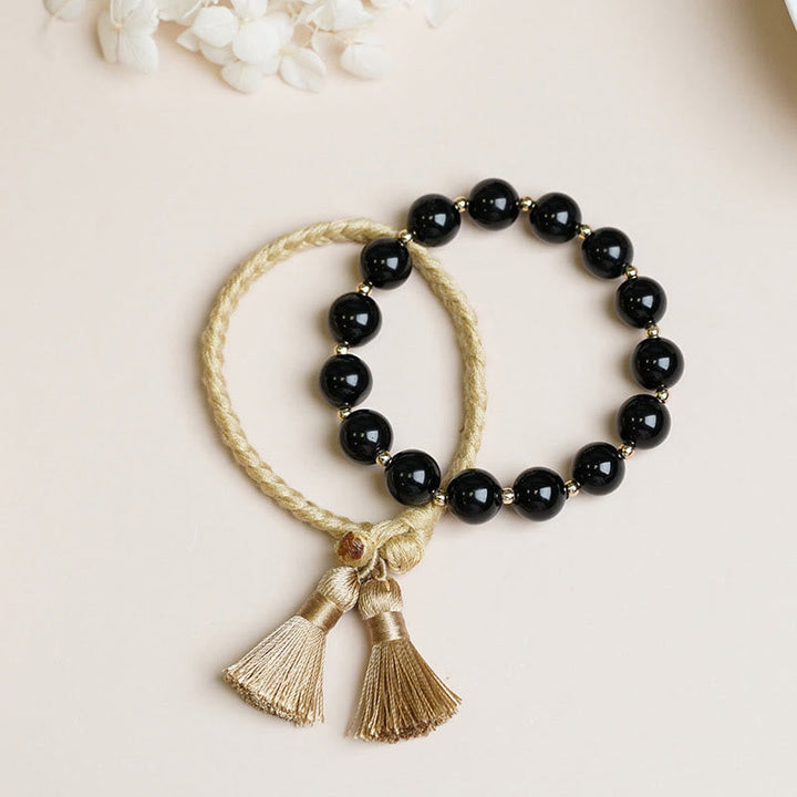 Armband Schwarzer Onyx – Schutz mit Quaste Naturstein elegant