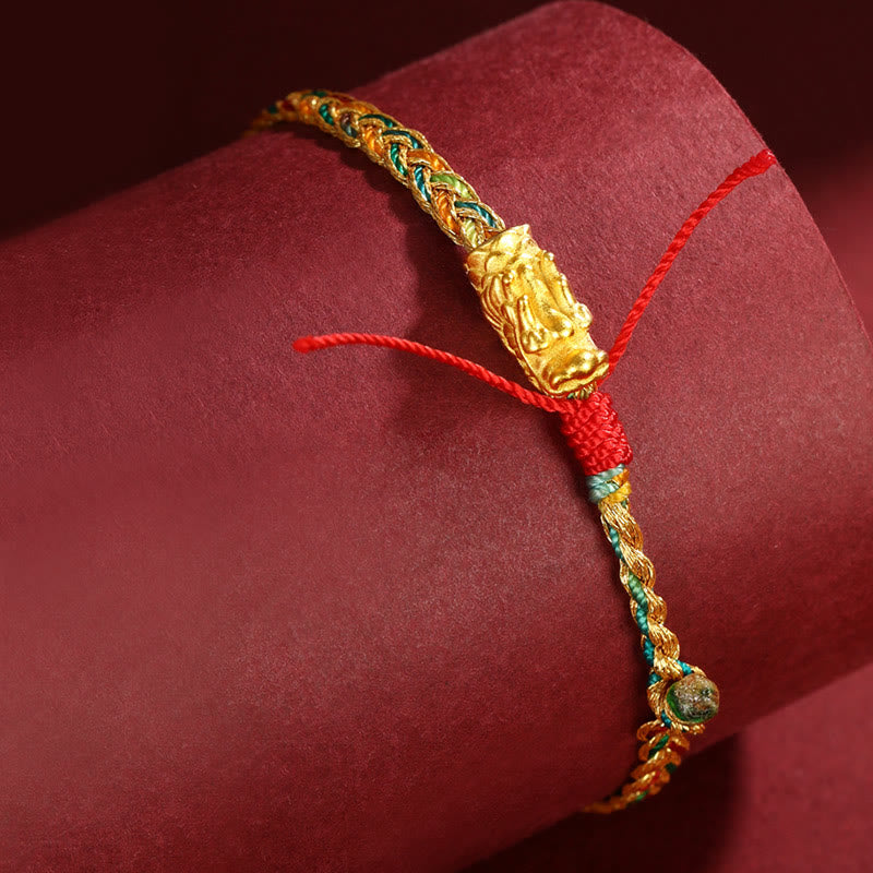 Armband Drachen – Erfolg mit goldenem Drachen-Anhänger rot elastisch.