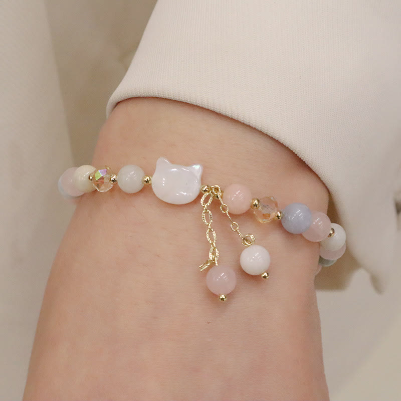 Armband Erdbeerquarz Katze Liebe Perlen Naturstein elegant.