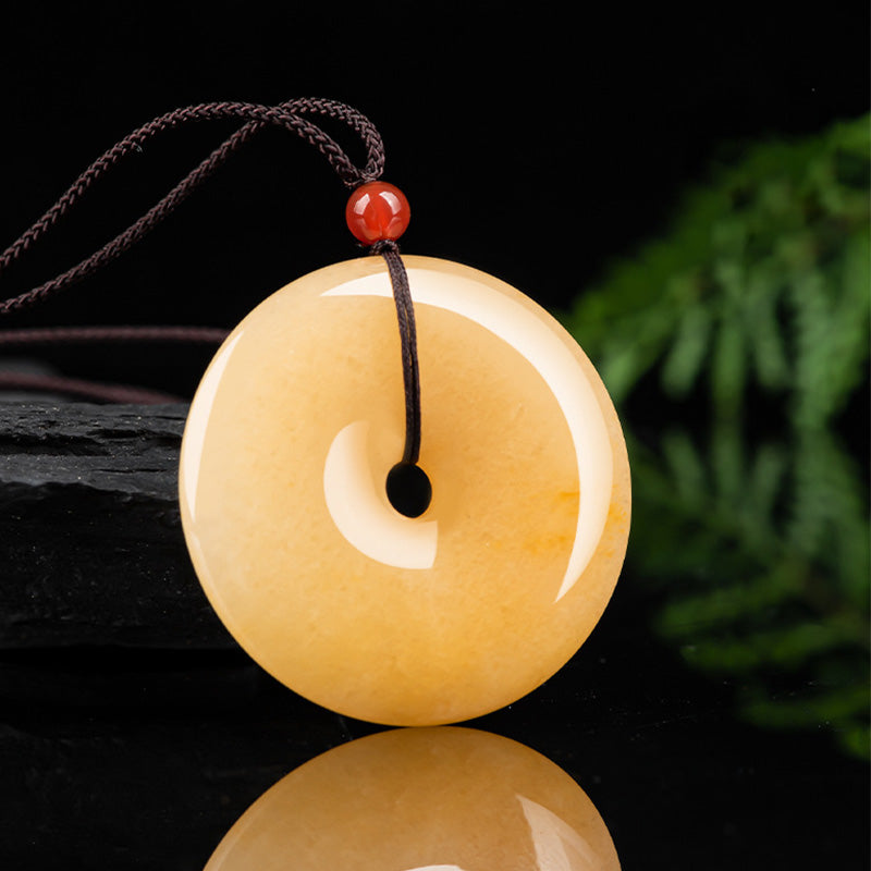 Kette goldene Jade Anhänger rund Naturstein
