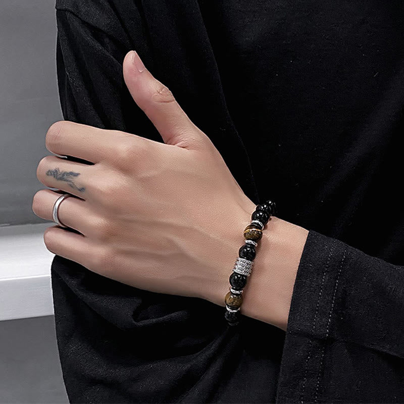 Armband Schwarzer Obsidian Tigerauge – Stärke elastisch am Handgelenk getragen