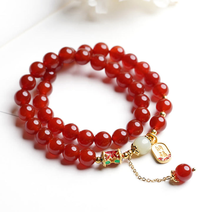 Armband Roter Achat mit Jade und Fu-Zeichen Anhänger elegant.