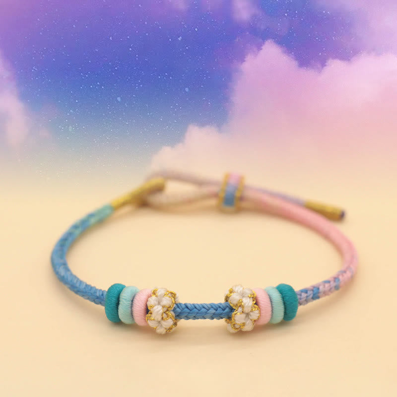 Armband Pfirsichblüte mit Perlen blau rosa grün elastisch Glück Frieden
