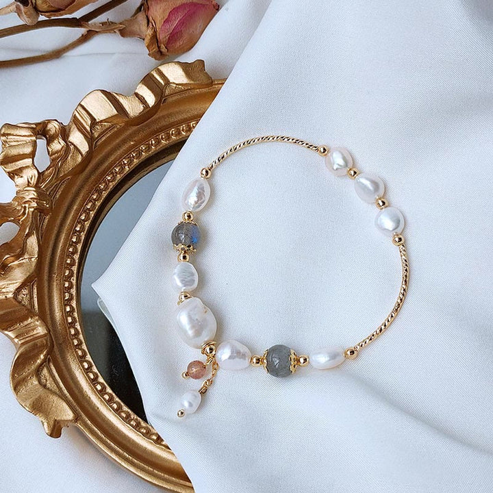 Armband Mondstein Erdbeerquarz Perlen gold elegant Schmuck.