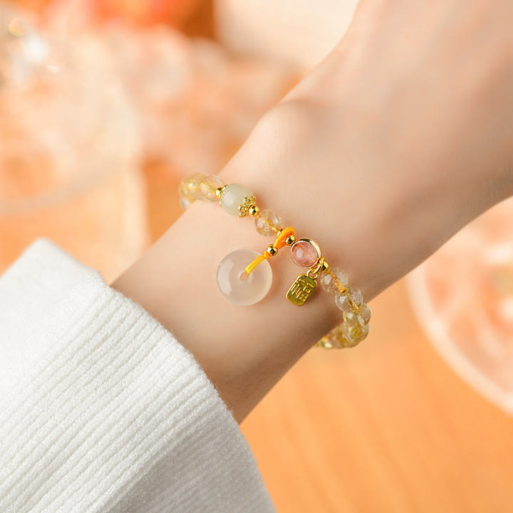 Armband Fu-Zeichen Wohlstand Frieden Citrin Perlen gold elegant Handgelenk
