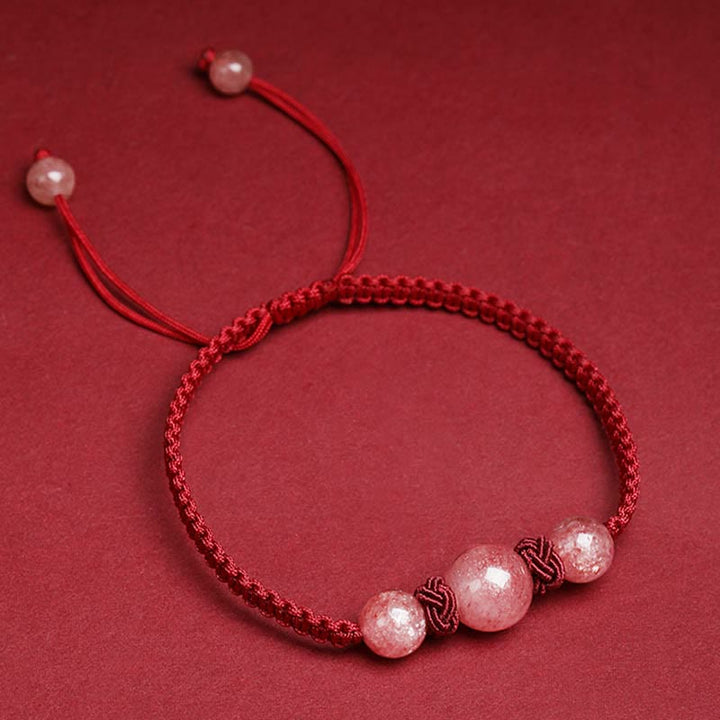 Rotes Armband Erdbeerquarz Kristall mit elastischem Seidenband