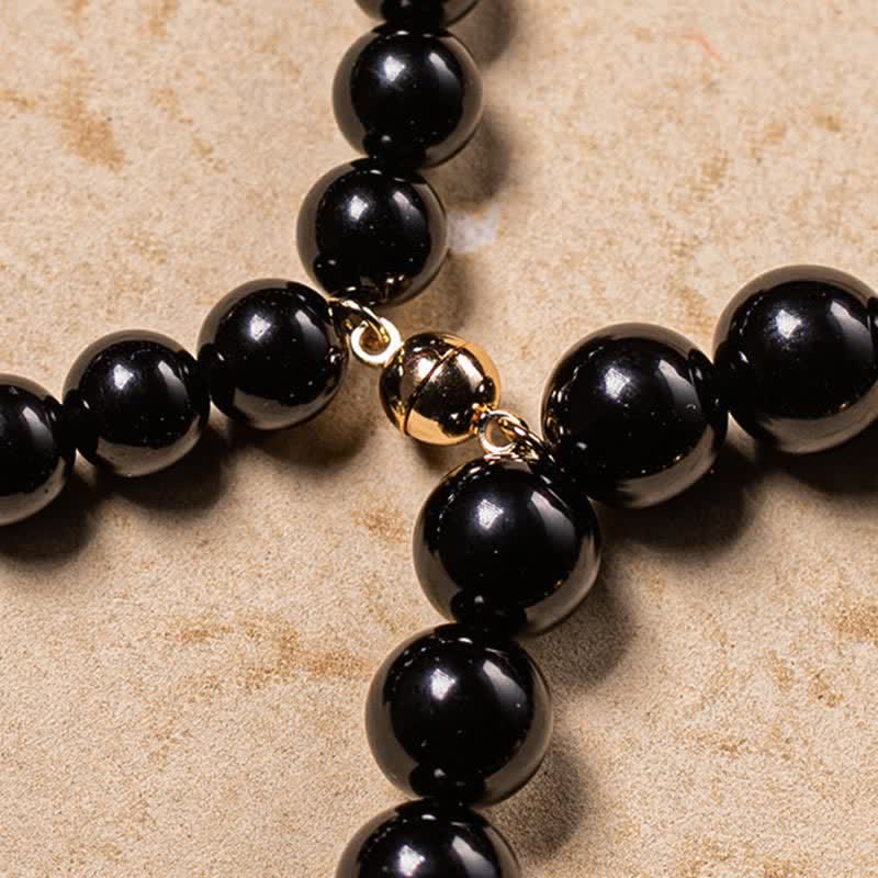 Schwarzer Obsidian Armband mit goldenen Om Mani Padme Hum Perlen Schmuck