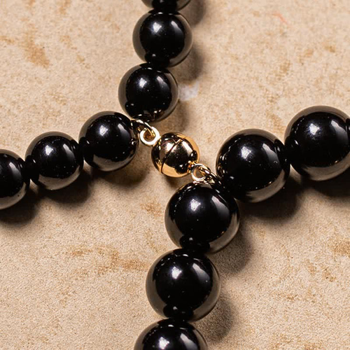 Schwarzer Obsidian Armband mit goldenen Om Mani Padme Hum Perlen Schmuck