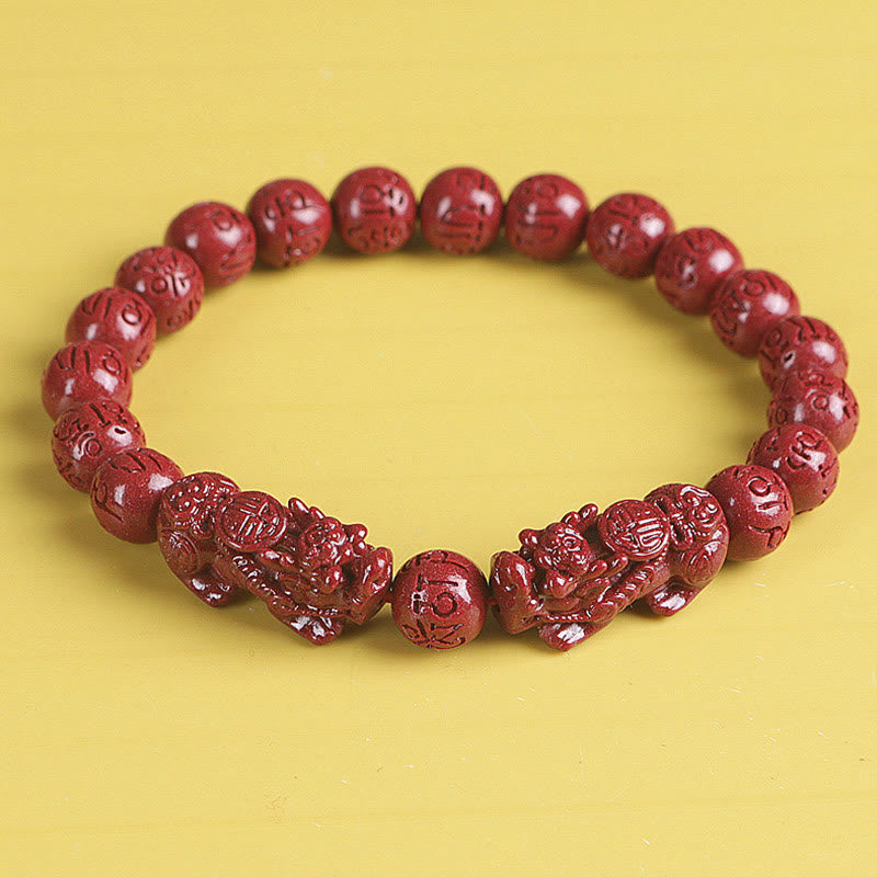 Armband Zinnober Om Mani Padme Hum rotes Perlenarmband mit Löwen Perlen elastisch