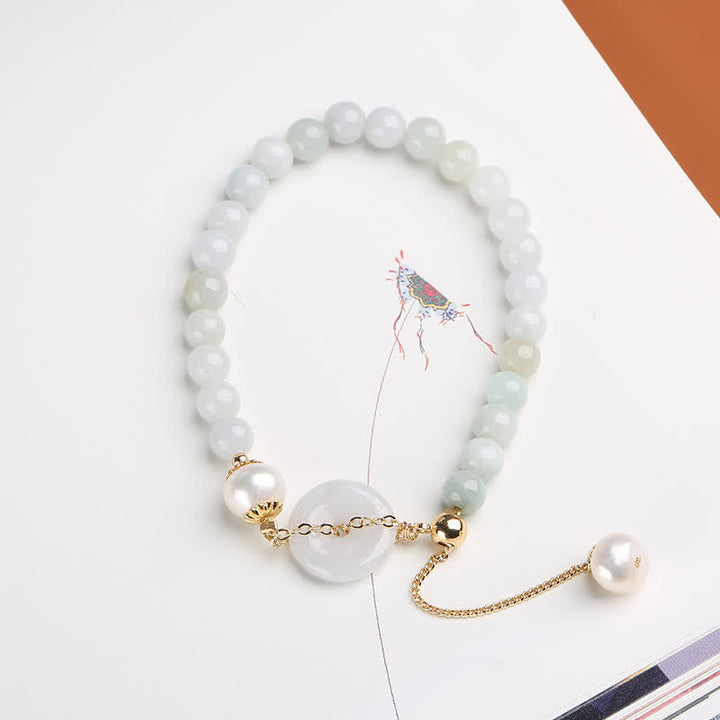 Armband Perle Jade – Glück & Frieden mit weißen Natursteinperlen goldenen Elementen