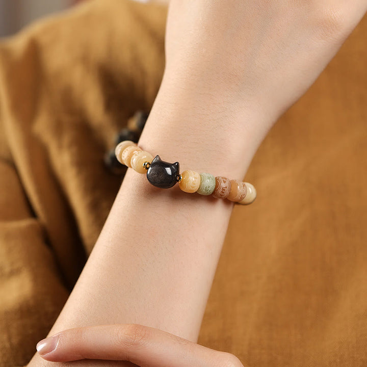 Obsidian Armband mit Bodhi Perlen am Handgelenk getragen elegant