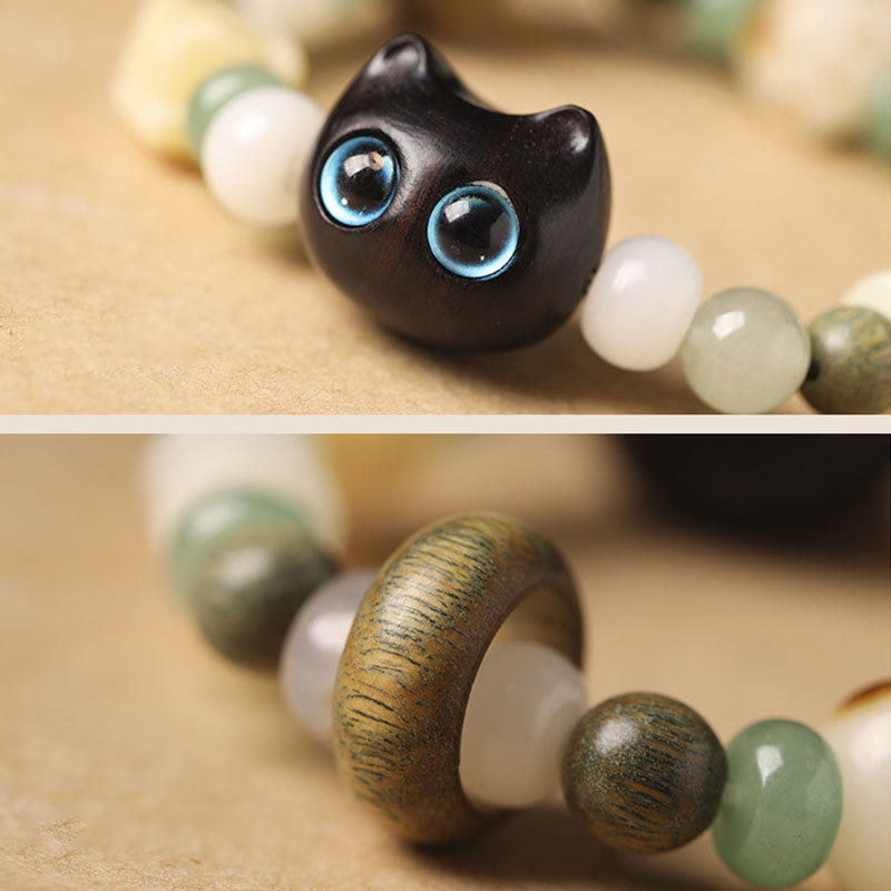 Schwarze Katze Armband mit blauen Augen und Natursteinen Bodhi.