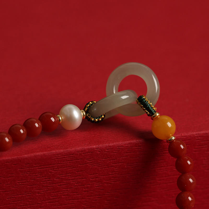 Armband Roter Achat Jade mit grauem Stein elegantes Design.