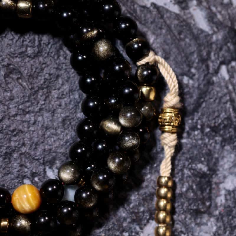 Mala Tigerauge Obsidian Armband schwarze Perlen goldene Akzente Wohlstand