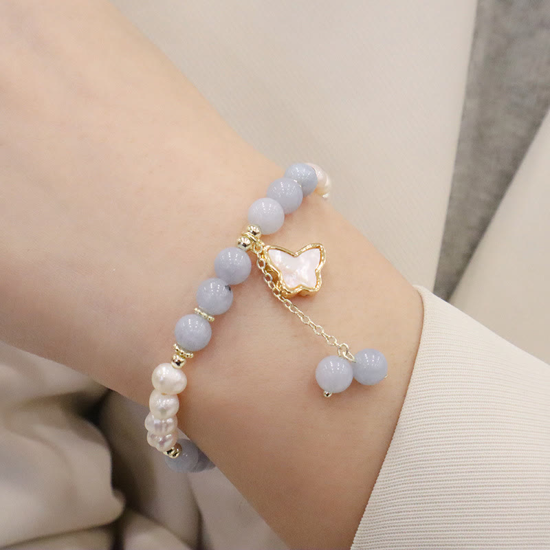 Armband Aquamarin Perle Schmetterling Heilung elastisch Handgelenk getragen Naturstein