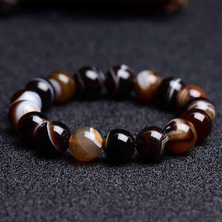 Armband Onyx – Glück Energie braun schwarz Naturstein glänzend elastisch