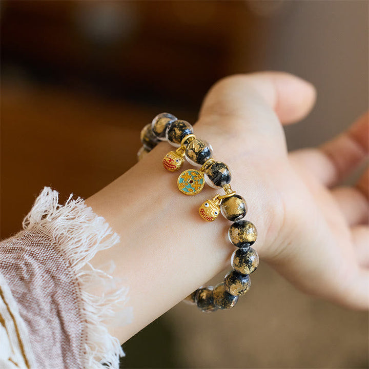 Armband Kupfer Goldverschlingendes Wesen – Glück am Handgelenk getragen elastisch