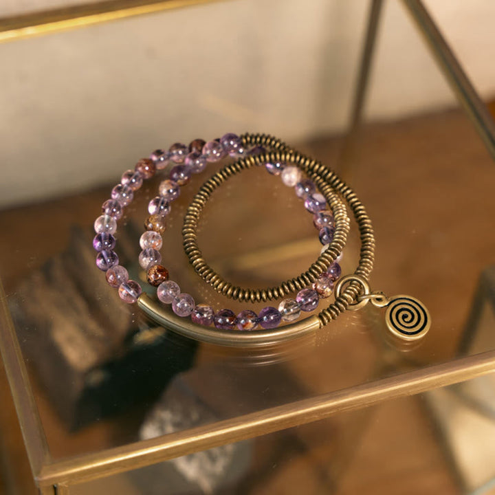 Armband Kupfer – Liebe mit Amethyst Perlen und Spiralanhänger elegant.