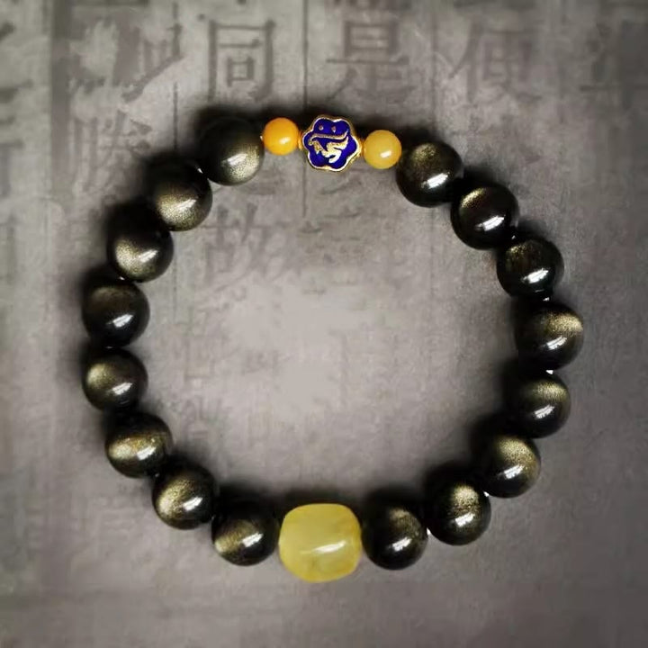 Schwarzes Obsidian Armband mit gelben Steinen und chinesischem Tierkreis Anhänger