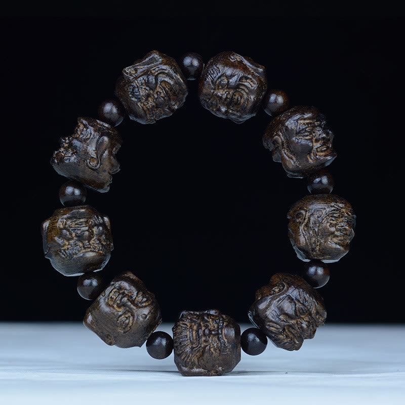 Armband Ebenholz Drachen – Balance mit geschnitzten Perlen elegant arrangiert