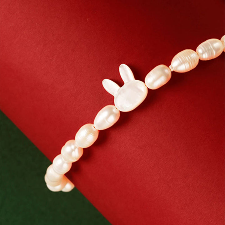 Armband Perle Hase Aufrichtigkeit weiß elastisch Perlenarmband Schmuck
