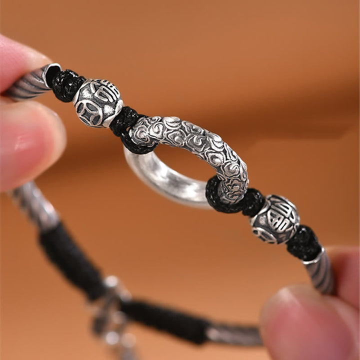 Armband 925 Silber mit schwarzen Perlen und Kupfer Elementen elegant getragen.