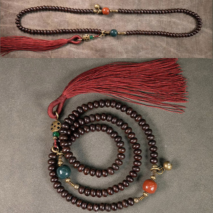 Mala 108 Perlen Bodhi Halskette mit roten Quasten Holzperlen Naturstein.