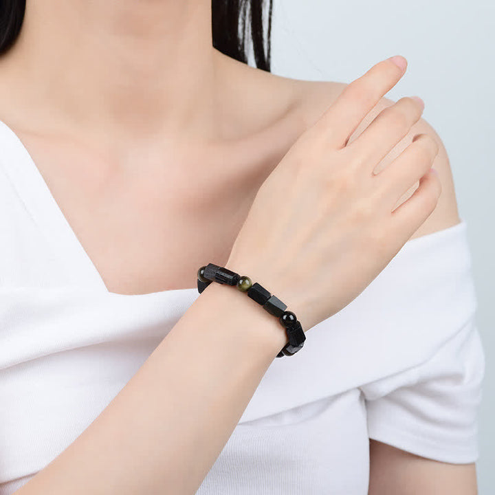 Obsidian Armband – Wohlstand am Handgelenk getragen, schwarzer Stein elegante Perlen