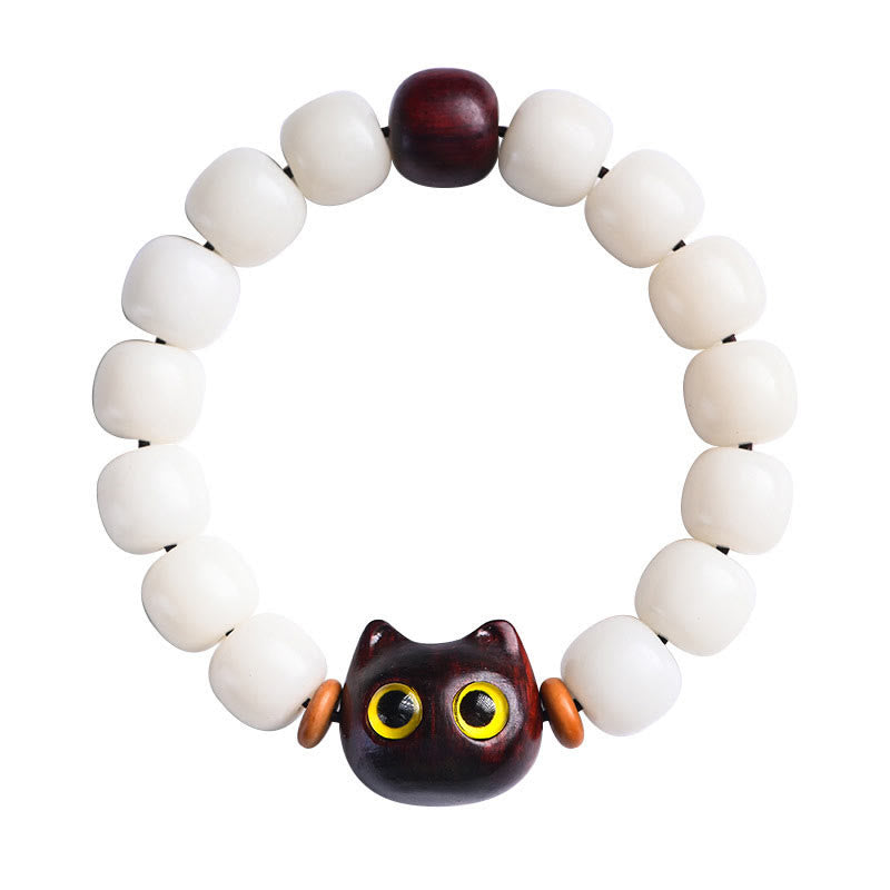 Armband Sandelholz Bodhi Katze weiße Perlen schwarze Glückskatze.