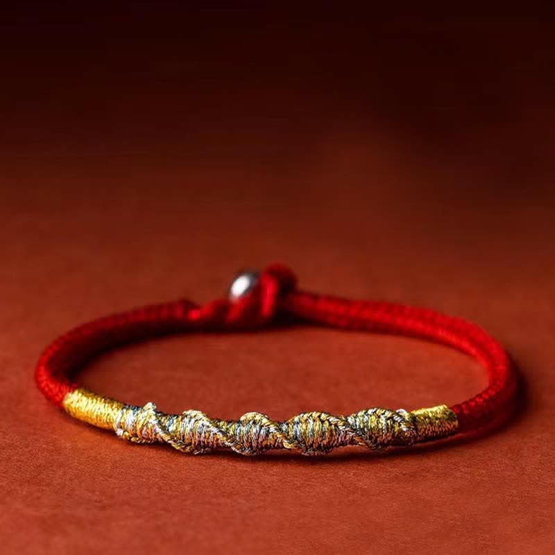 Rotes Seidenarmband mit goldenen Perlen Schutz Glück elegant