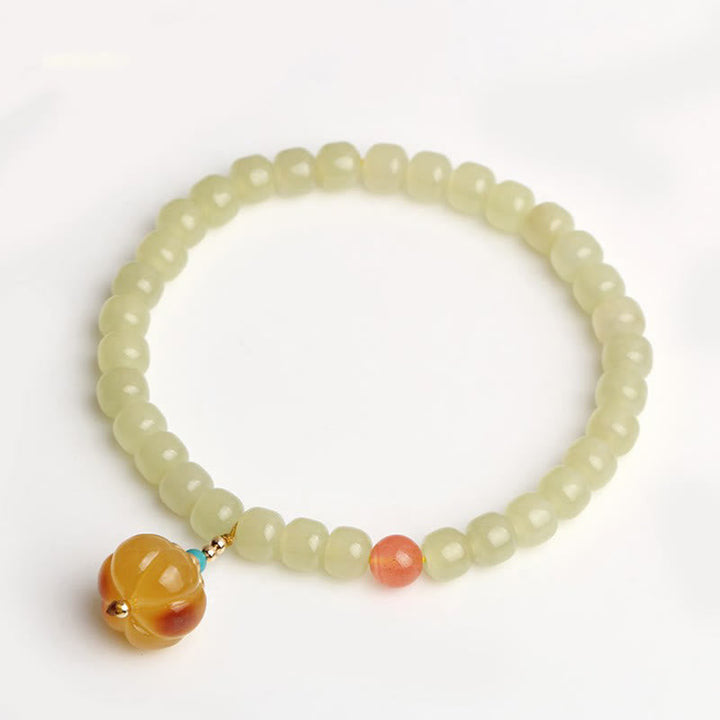 Armband Roter Achat Kristall – Wohlstand mit hellgrünen Perlen elastisch