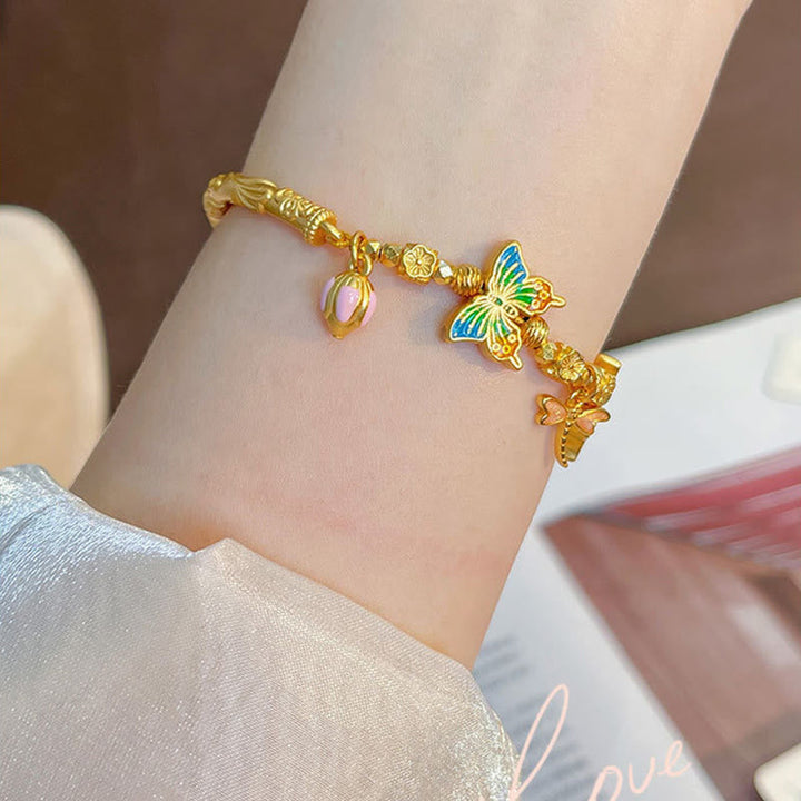 Armband 925 Silber Schmetterling Schutz farbenfroh am Handgelenk getragen