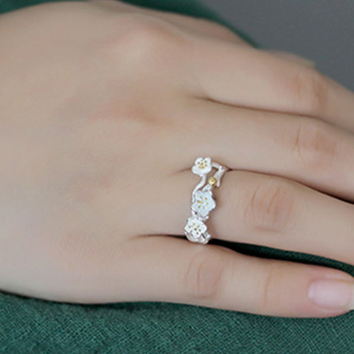 Silber Ring mit Pflaumenblüte Muster für Ruhe und Harmonie Schmuck