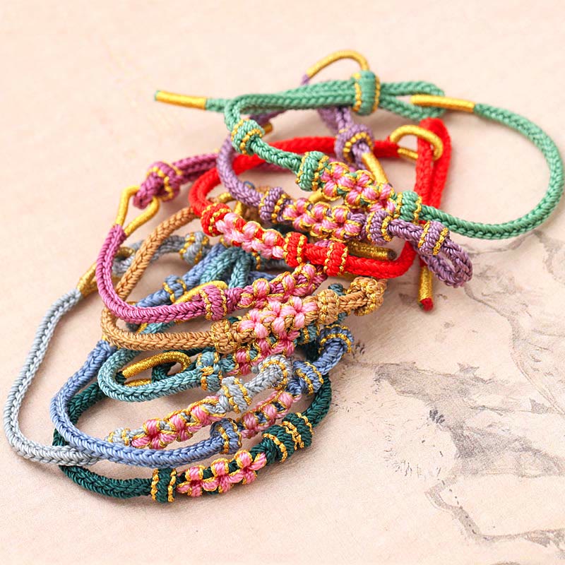 Bunte Armbänder mit Pfirsichblüte Motiv elastisch verstellbar Glück