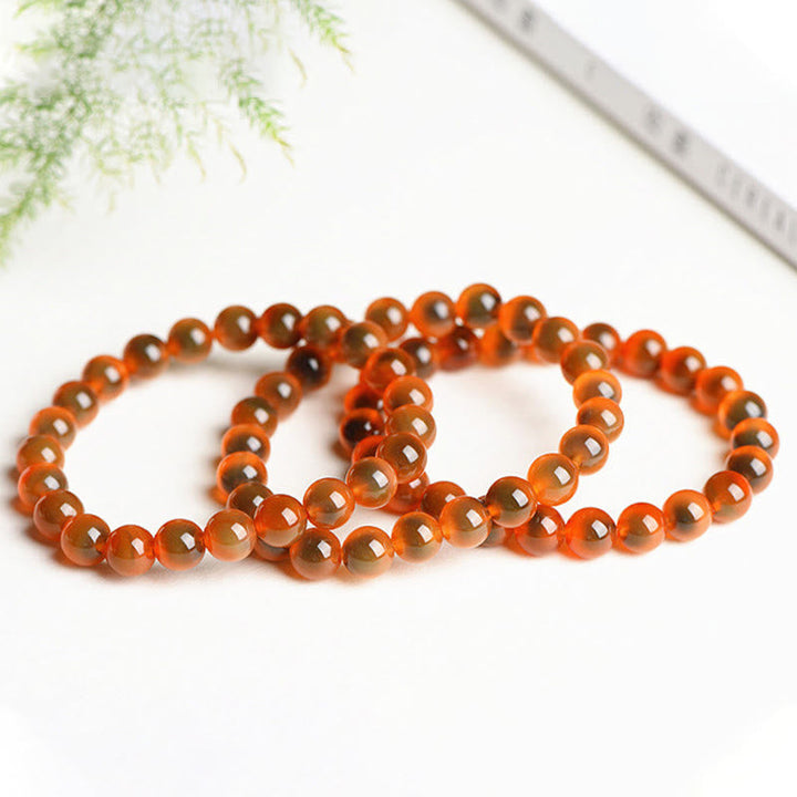 Armband Achat – Stärke & Harmonie, orange Naturstein Perlen elastisch getragen