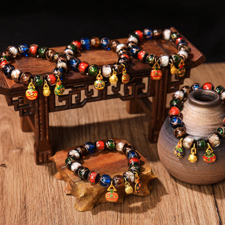 Armband Fünf Elemente – Glück Balance bunte Perlen Holzständer Dekoration