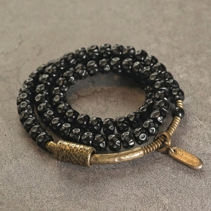 Schwarzes Perlen Armband Kupfer Retro Coconut – Glück elastisch