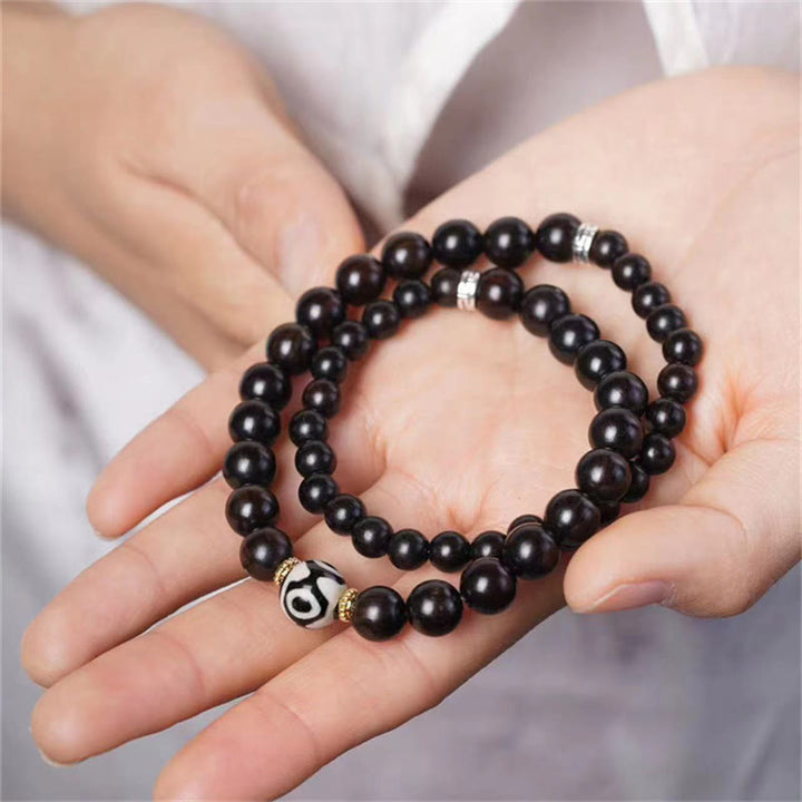 Armband Ebenholz Dzi – Balance & Schutz