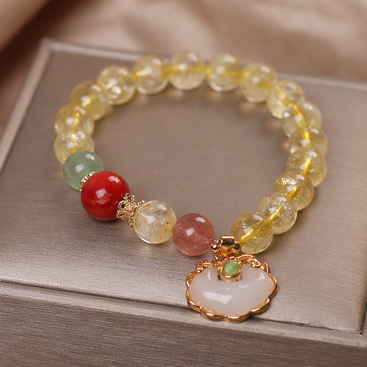 Armband mit Erdbeerquarz, weißer Jade und Citrin Perlen Nahaufnahme