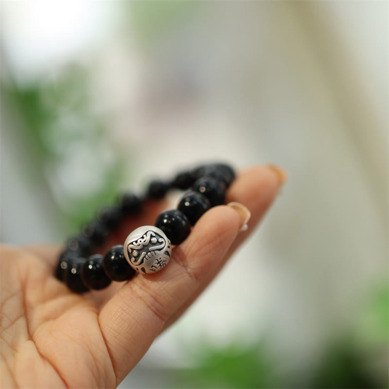 Schwarzes Onyx Armband 925 Silber Schutz Naturstein elegant getragen